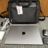 Mac laptop kit including a laptop, carrying case, charger, mouse, and mobile hotspot