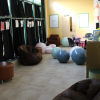 room with chairs and exercise balls