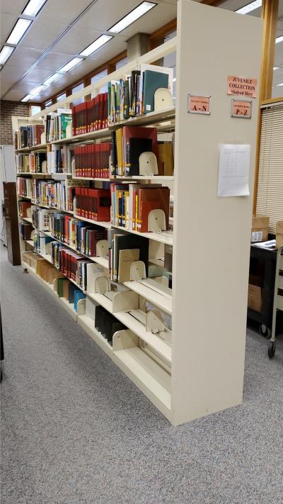 Library shelving. Photo courtesy of Ron Barshinger (2021).