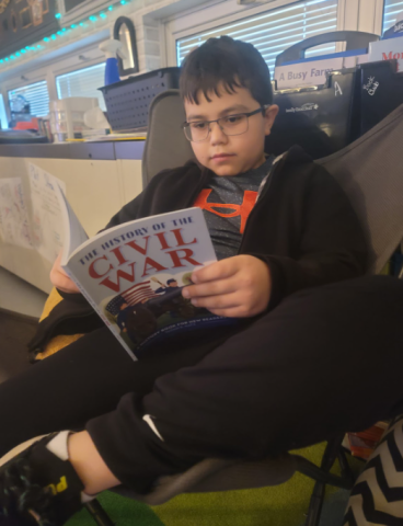 Student reading book.