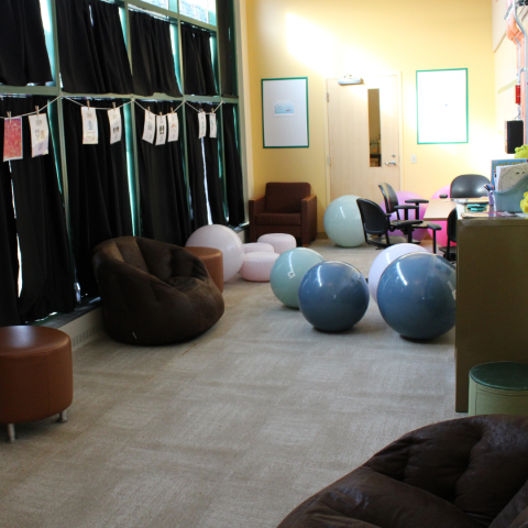 room with chairs and exercise balls