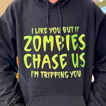 Someone wearing a sweatshirt that says "I like you, but if zombies chase us, I'm tripping you."
